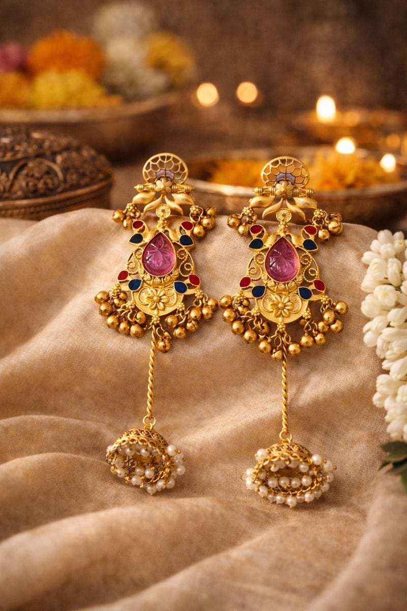 Traditional Gold Jhumka Earrings with Gemstones